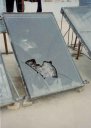 Another view of a broken solar collector on Dr. Zahdeh's roof.