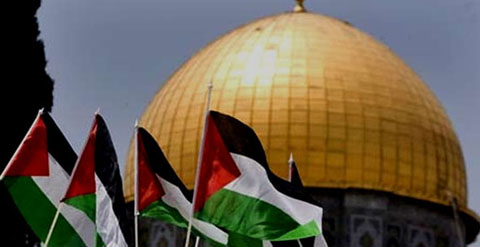 Sakhra, (Dome of the Rock) and Palestinian Flags.