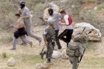 Reshef's death squad troops arresting children near Ramallah.